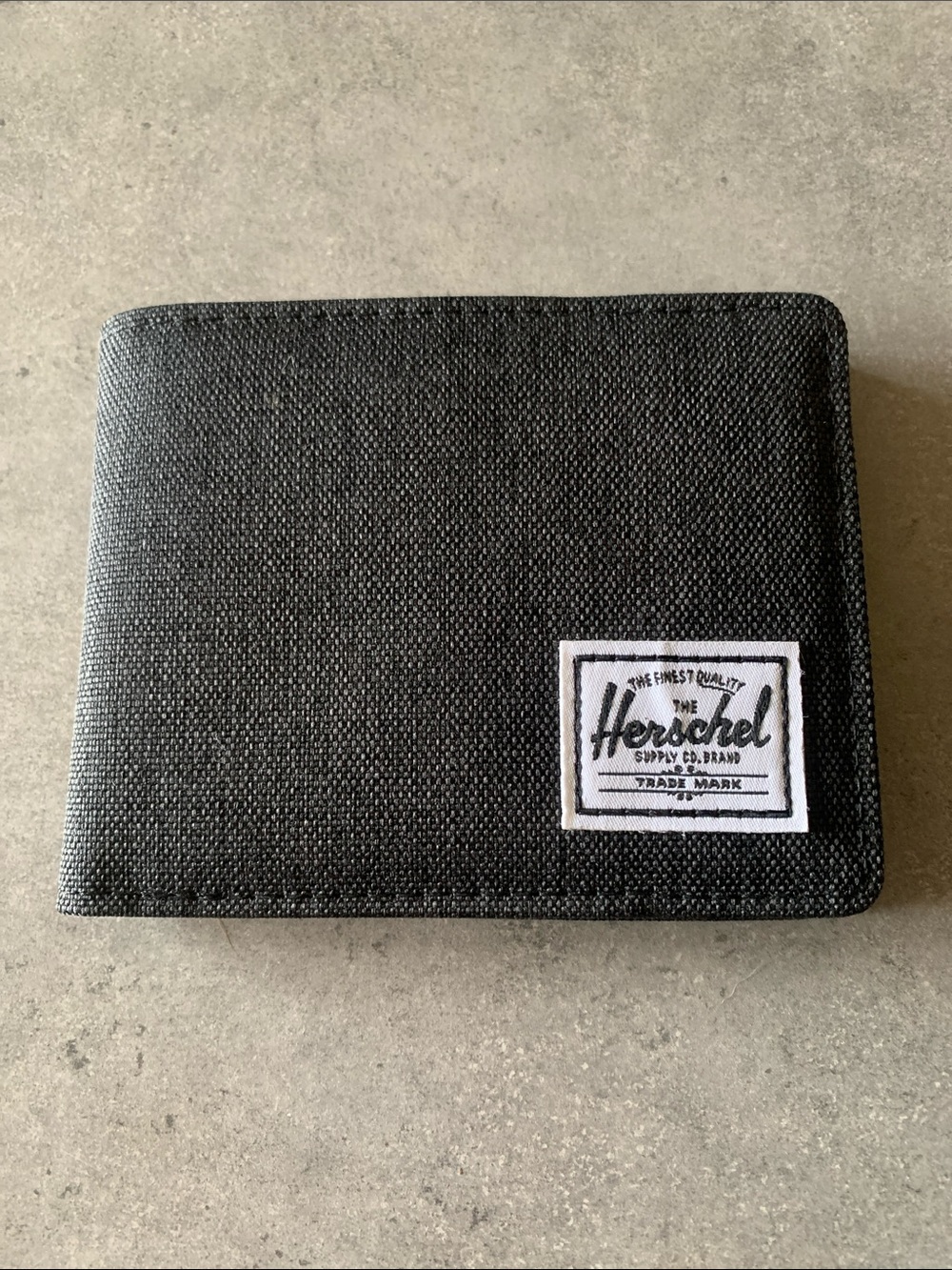 Herschel Supply Company Black Canvas Bi-Fold Wallet with White Logo Patch